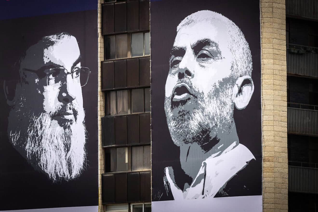 Photographs of Hezbollah chief Hassan Nasrallah (left) and Hamas leader Yahya Sinwar posted on Begin Boulevard in Jerusalem, April 2, 2024. Photo by Chaim Goldberg/Flash90,