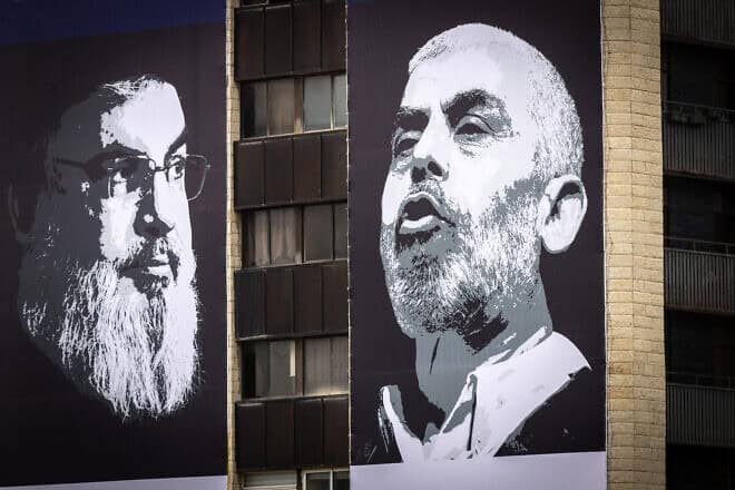 Photographs of Hezbollah chief Hassan Nasrallah (left) and Hamas leader Yahya Sinwar posted on Begin Boulevard in Jerusalem, April 2, 2024. Photo by Chaim Goldberg/Flash90,