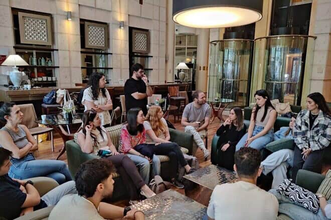 University of Haifa Law students attend a briefing with University lawyers at a hotel before the team began assisting evacuees in the early days of the war.(Courtesy)