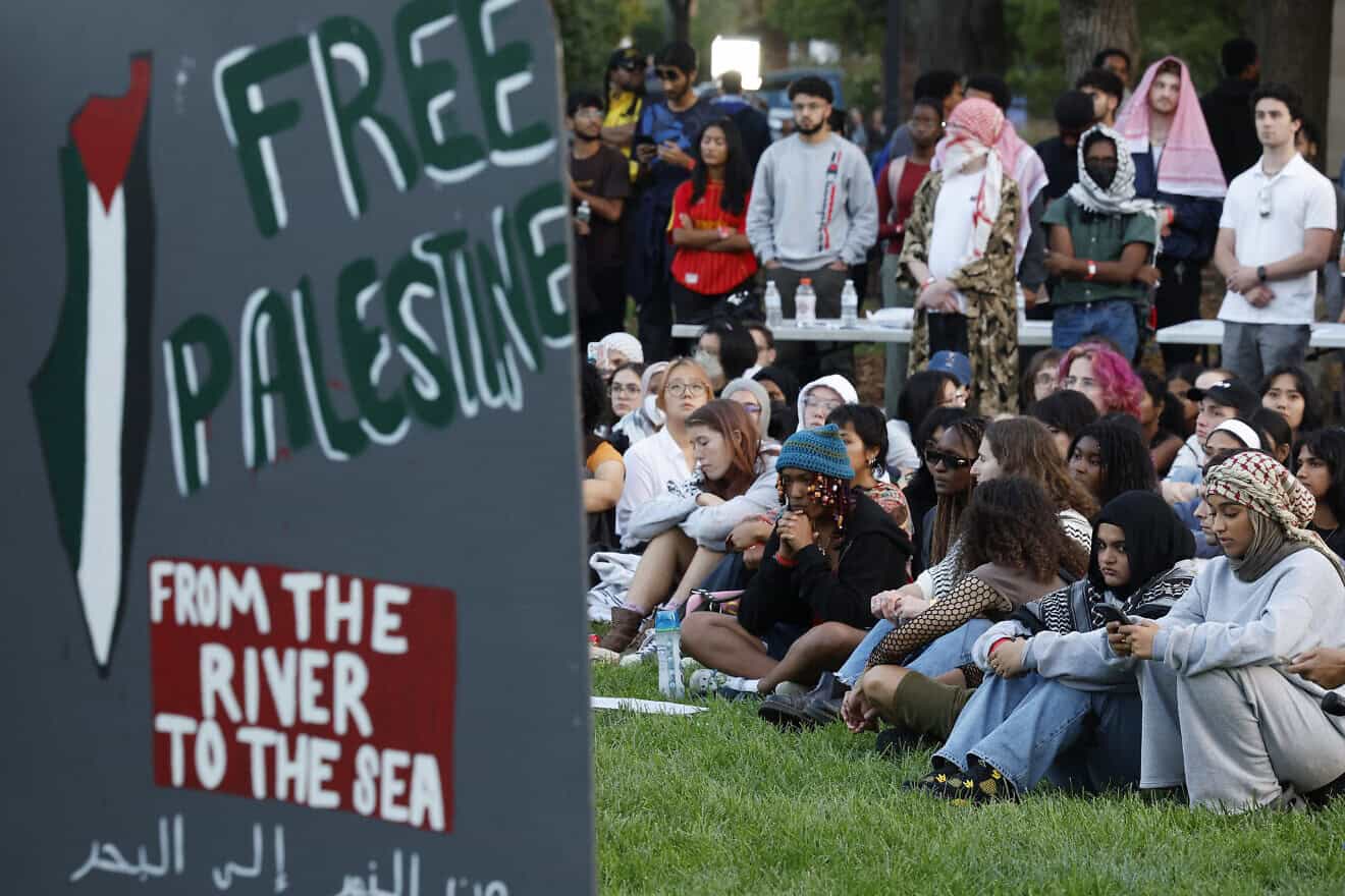 Attendees gather for a vigil organized by the University of Maryland campus chapter of Students for Justice in Palestine, along McKeldin Mall, in College Park, Md., on Oct. 7, 2024. Photo by Chip Somodevilla/Getty Images.