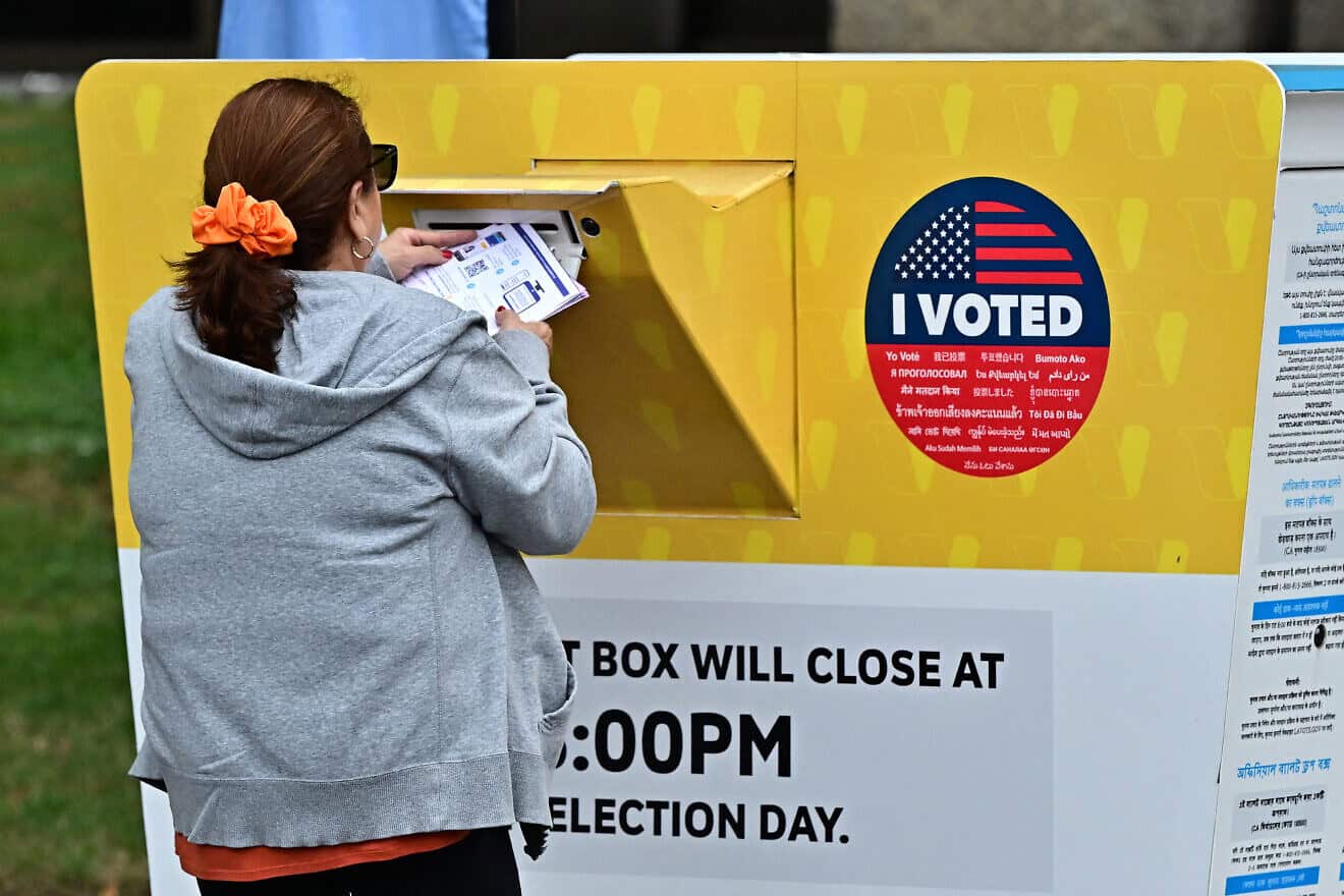 A woman drops off her ballot at the Los Angeles County Registrar in Norwalk, Calif., two days after early voting in Los Angeles County began ahead of the Nov. 5 presidential election, on Oct. 28, 2024. Photo by Frederic J. Brown/AFP via Getty Images.