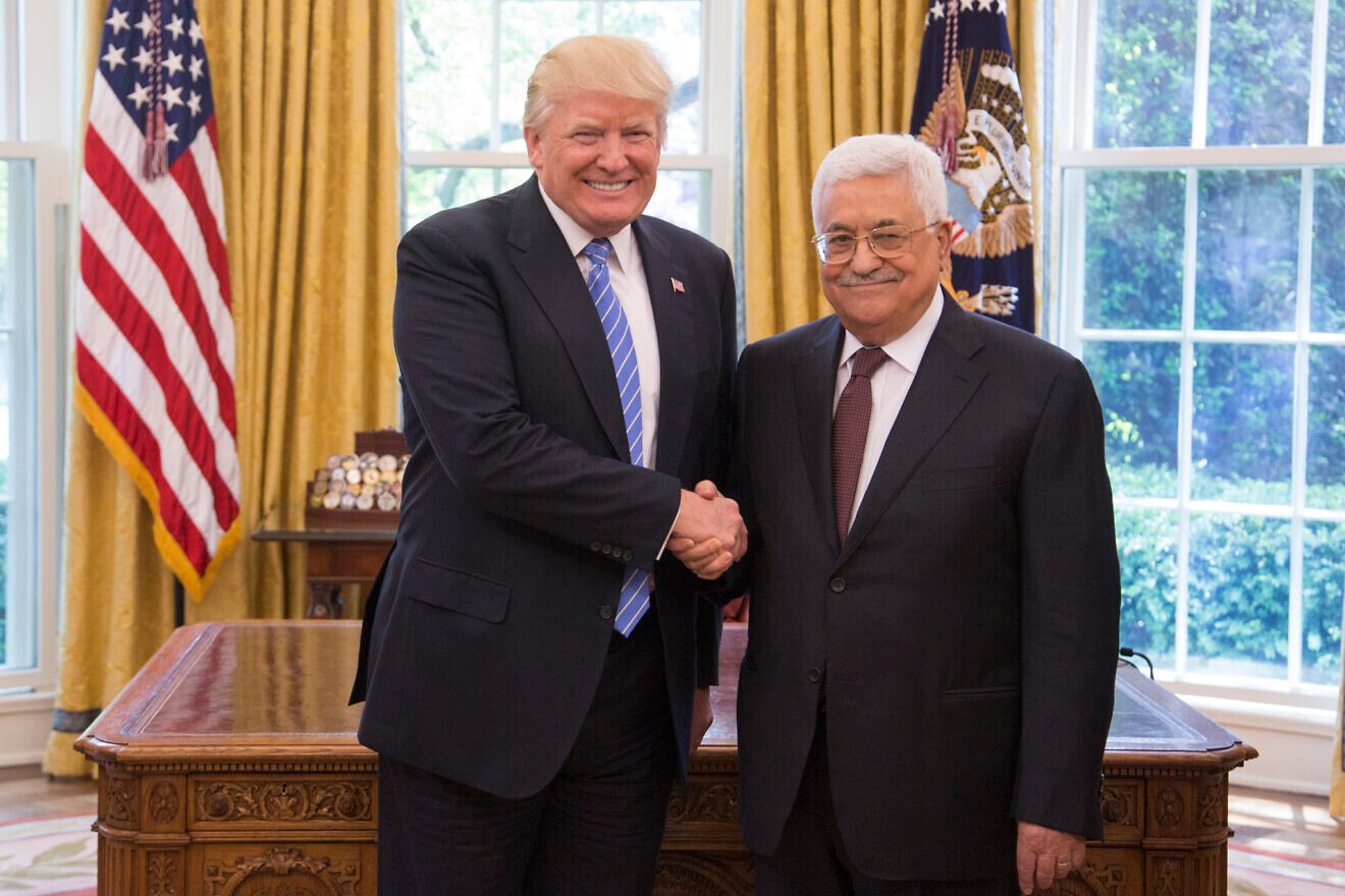 President Donald Trump and Palestinian Authority leader Mahmoud Abbas shake hands as they meet, May 3, 2017, in the Oval Office of the White House in Washington, D.C. Credit: Shealah Craighead/White House.