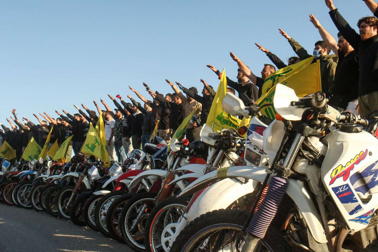 Hezbollah terrorists salute in Lebanon's Marjayoun District, near the border with Israel, May 25, 2020. Photo by Mahmoud Zayyat/AFP via Getty Images.