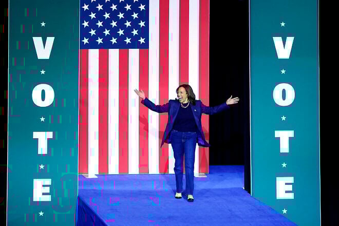 Vice President and Democratic presidential nominee Kamala Harris walks on stage as she arrives for a campaign rally at Michigan State University's Jenison Field House in East Lansing, Mich., on Nov. 3, 2024. Photo by Jeff Kowalsky/AFP via Getty Images.
