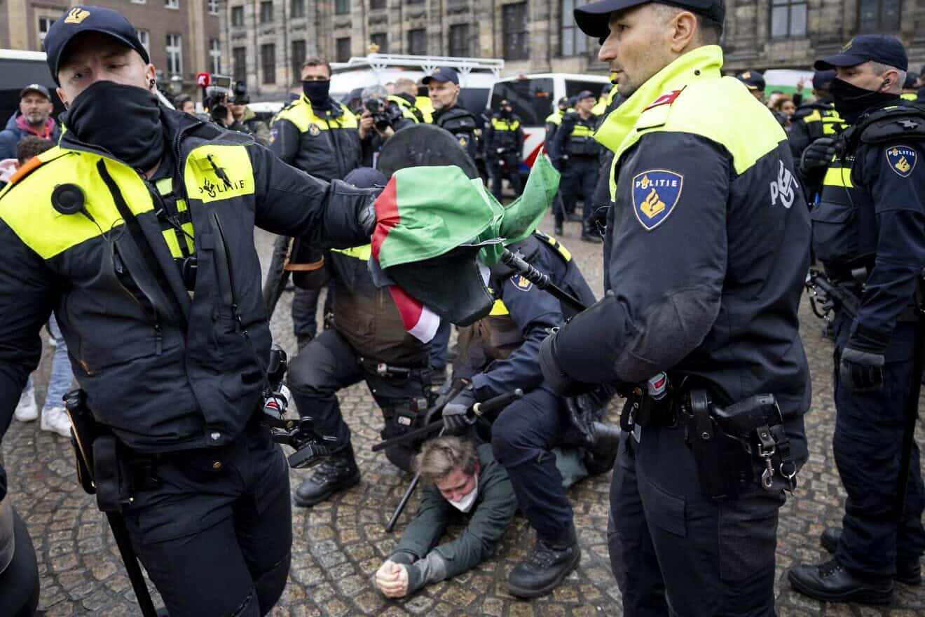 Police officers clash with protestors during a demonstration on Dam Square on Nov. 10, 2024. Photo by Robin van Lonkhuijsen/ANP/AFP via Getty Images.