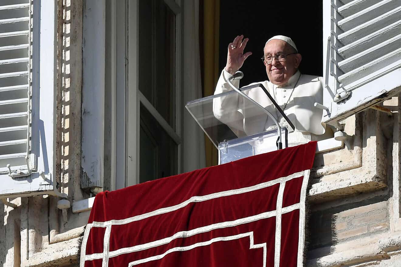 Pope Francis waves  to the faithful gathered in St. Peter's Square during his Sunday Angelus blessing on The Day Of The Poor on Nov. 17, 2024 in Vatican City, Vatican. Photo by Vatican Media via Vatican Pool/Getty Images.