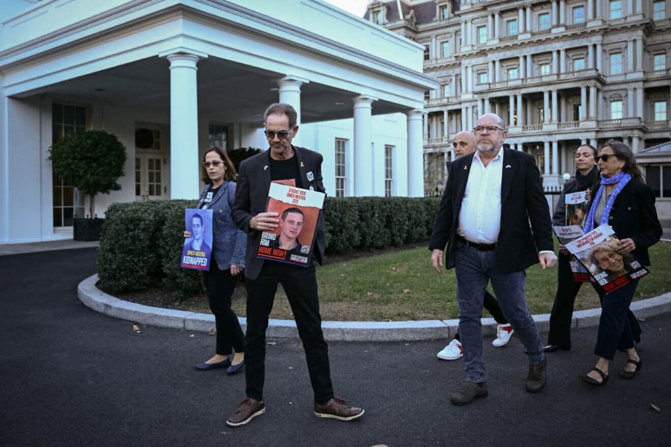 Orna Neutra (left) and Ronen Neutra (second from left), parents of Omer Neutra, and other families of Americans being held hostage by Hamas stand outside the White House after a meeting with administration officials on Nov. 12, 2024. Photo by Brendan Smialowski/AFP via Getty Images.
