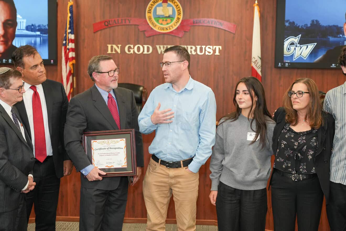 Attending an Orange County Board of Education meeting are, from left, Jerry Isaac-Shapiro, senior director of the Rose Project;
Board of Education trustee Jorge Valdes; Board of Education trustee Ken L. Williams, Jr.; Chen Shterenbach, director of community relations and the Rose Project; high school student Mia Ben Zvi; and, Student-to-Student coordinator Robin Steinmetz. Photo by John Wolfsohn, Jewish Federation of Orange County.