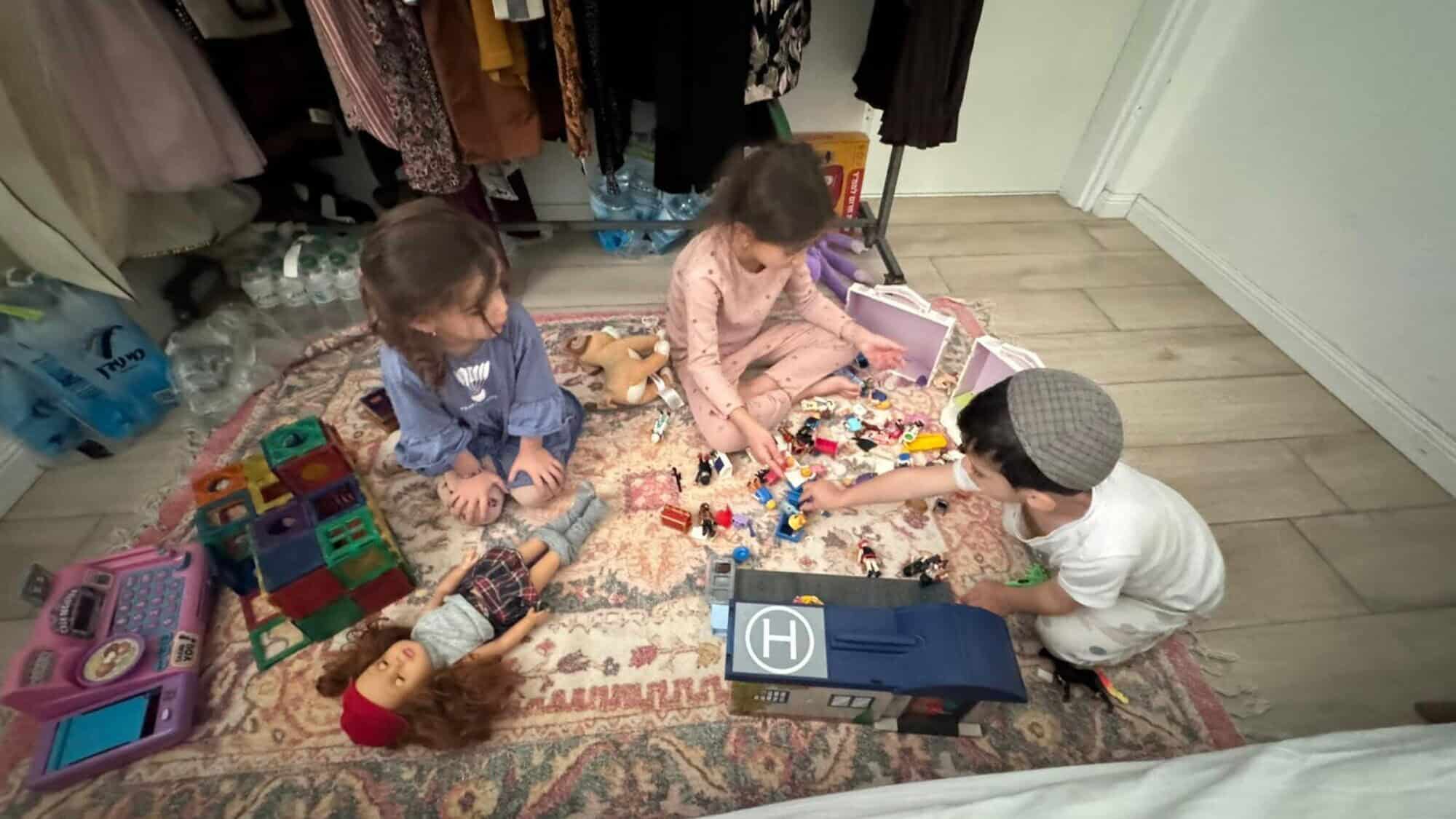 The Vaknin kids playing in the family bomb shelter in Netivot, nine miles from the Gaza Strip. Credit: Courtesy.