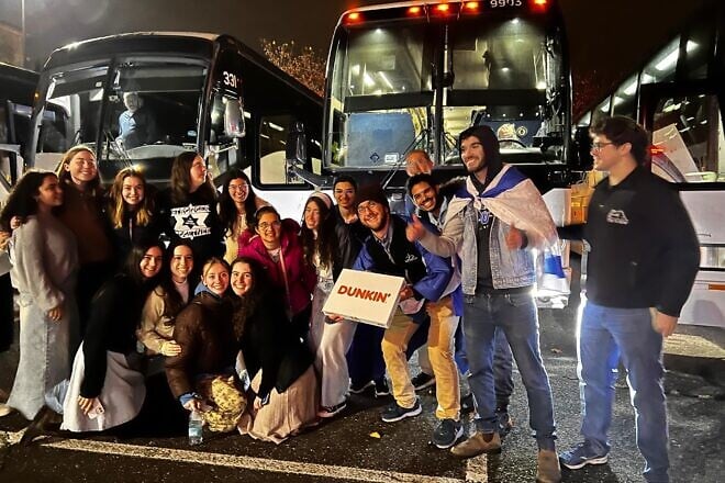 Yeshiva University students pose in Washington, D.C., before boarding buses to return to New York after a “Stand Together” pro-Israel rally at the District’s Nationals Park baseball stadium, on Nov. 10, 2024. Credit: Courtesy.