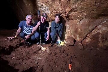 Prof. Ofer Marder, Prof. Israel Hershkovitz and Dr. Omry Barzilai in the Manot Cave. Credit: Omry Barzilai.