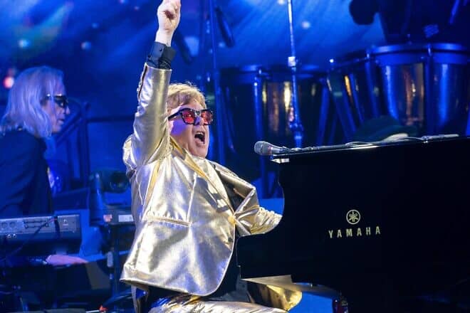 Musician Elton John performs "Rocket Man" during his Glastonbury Festival show, June 25, 2023. Credit: Raph_PH via Wikimedia Commons.