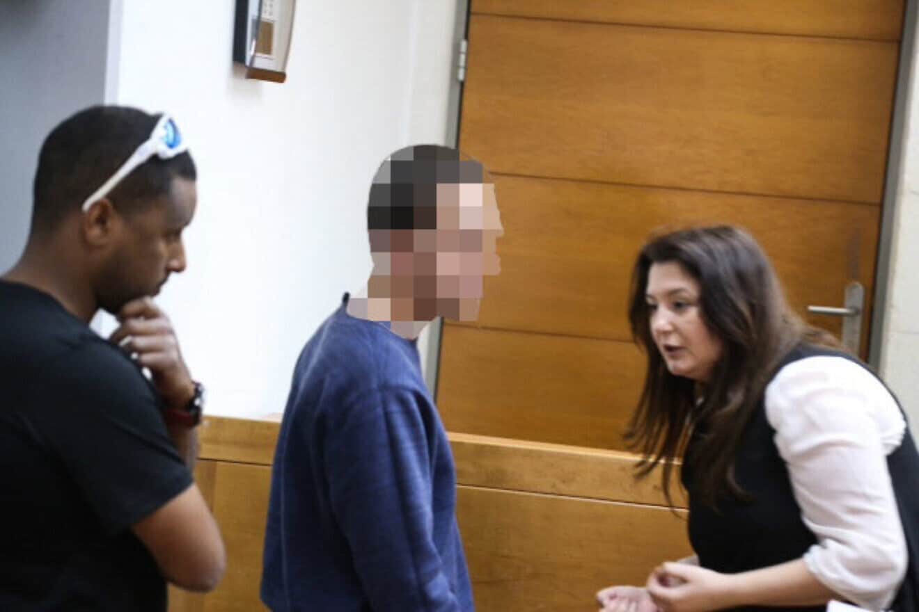 A man brought for a court hearing at the Rishon Lezion Magistrate's Court, under suspicion of Issuing fake bomb threats against Jewish institutions around the world, on March 23, 2017. Photo by Flash90.