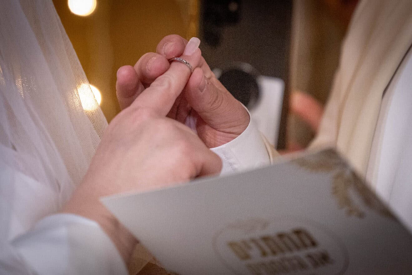 Ten Israeli couples with a member serving in the Israel Defense Forces taking part in a mass wedding ceremony part of Chabad of Savyon’s “Marrying the Warriors,” in Tel Aviv Port, March 5, 2024. Photo by Chaim Goldberg/Flash90.
