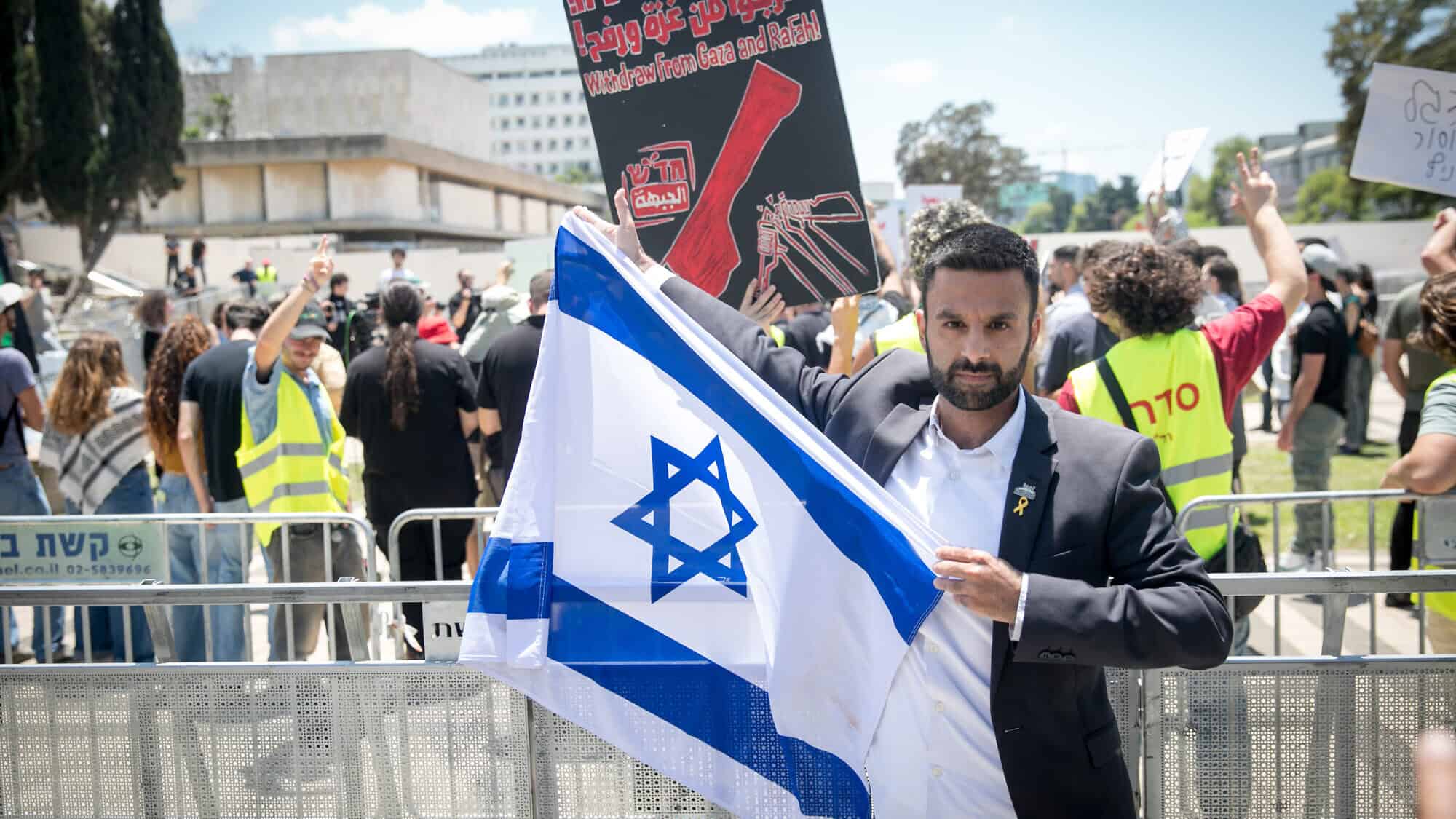 Yoseph Haddad, an Arab pro-Israel activist, protests next to a left-wing anti-Israel rally at Tel Aviv University, May 15, 2024. Photo by Miriam Alster/Flash90.