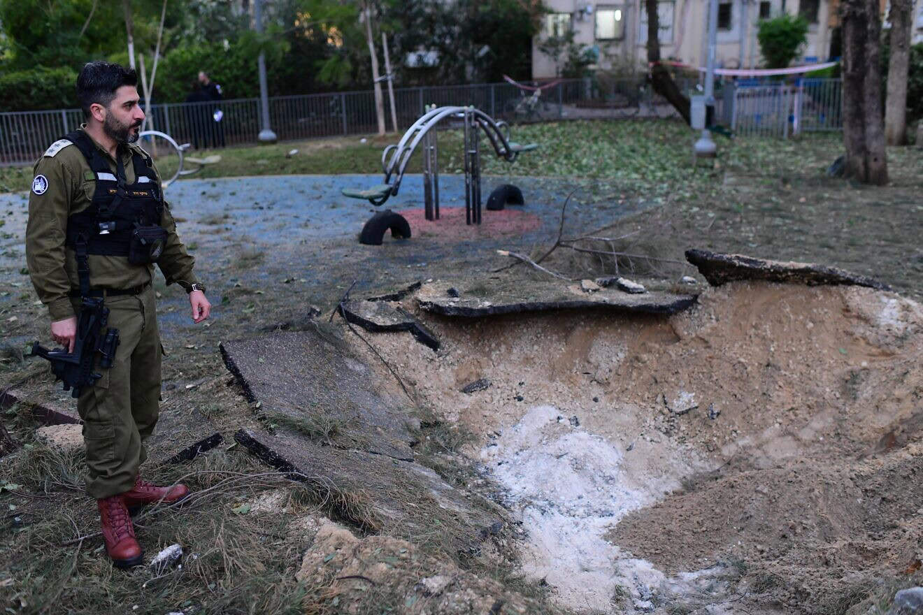 Israeli security forces at the scene where a ballistic missile fired from Yemen hit a playground in Jaffa, on Dec. 21, 2024. Photo by Tomer Neuberg/Flash90.