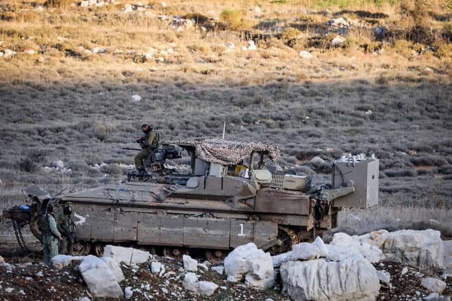 IDF soldiers operate on the Syrian side of the border fence with Israel, Dec. 25, 2024. Photo by Jamal Awad/Flash90.