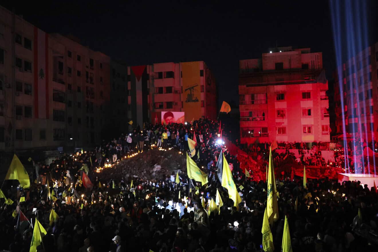 Mourners attend a vigil to honor Hezbollah's late terror chief Hassan Nasrallah, at the site where he was killed in an Israeli airstrike, in the Haret Hreik neighborhood of Beirut's southern suburbs on Nov. 30, 2024. Photo by Courtney Bonneau/Middle East Images/AFP via Getty Images.
