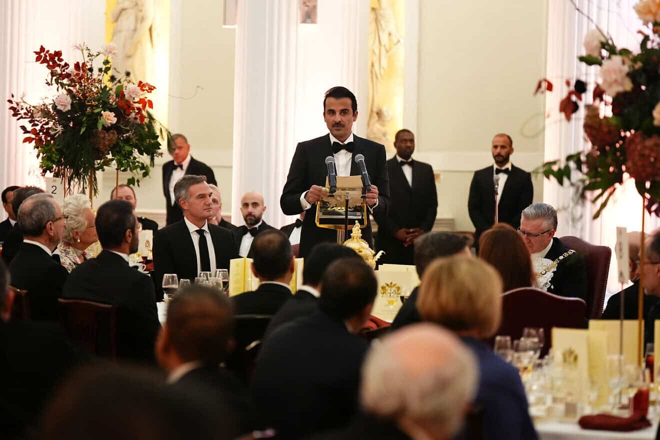 The Emir of Qatar Sheikh Tamim bin Hamad Al Thani speaks at a dinner at Mansion House during day two of a state visit to the United Kingdom, on Dec. 4, 2024 in London, United Kingdom. Photo by Aaron Chown - WPA Pool/Getty Images.
