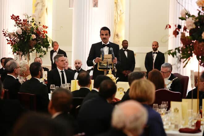The Emir of Qatar Sheikh Tamim bin Hamad Al Thani speaks at a dinner at Mansion House during day two of a state visit to the United Kingdom, on Dec. 4, 2024 in London, United Kingdom. Photo by Aaron Chown - WPA Pool/Getty Images.