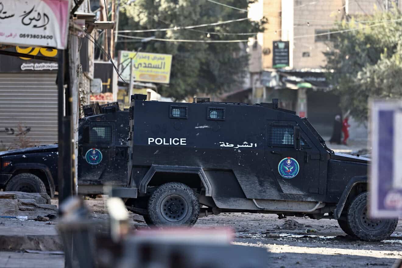 Palestinian Authority security forces block a road amid clashes with terrorists in Jenin, Samaria, Dec. 15, 2024. Photo by Zain Jaafar/AFP via Getty Images.