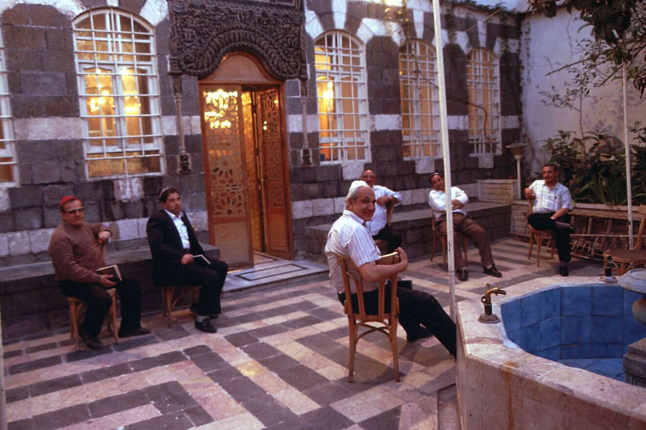 Jewish men in the courtyard in al-Firenj Synagogue in downtown Damascus, Syria,  April 14. 1994. Photo by Kaveh Kazemi/Getty Images.