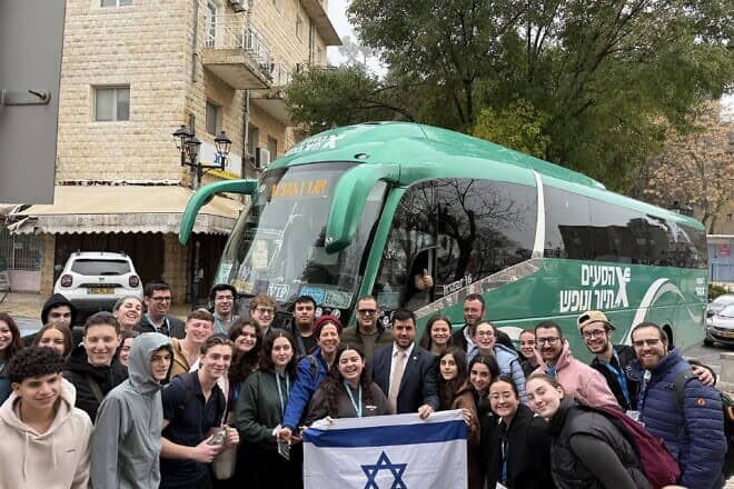Birthright Israel participants with Yossi Kakon, the mayor of Safed, December 2024. Credit: Courtesy of Nehemia Rosenfeld/Birthright Israel.