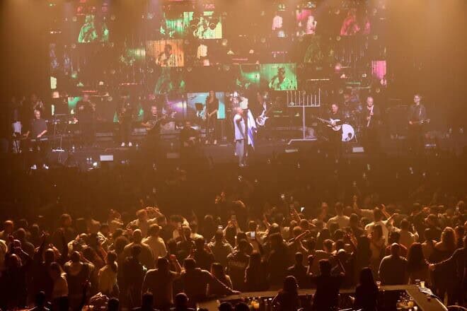 IDF soldiers enjoy the concert at Hangar 11, the Tel Aviv Port, Dec. 28, 2024.  Photo by Alex Kolomoisky/KKL-JNF.