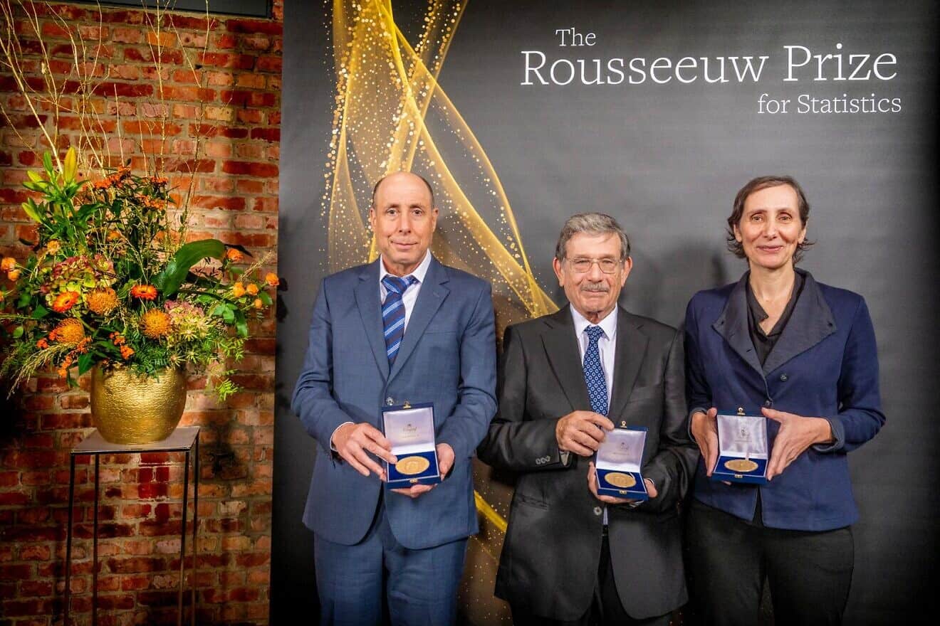 From left: Profs. Daniel Yekutieli, Yoav Benjamini and Ruth Heller of Tel Aviv University accept the Rousseeuw Prize for Statistics in Louvain, Belgium, on Dec. 3, 2024. Credit: Courtesy of Tel Aviv University.
