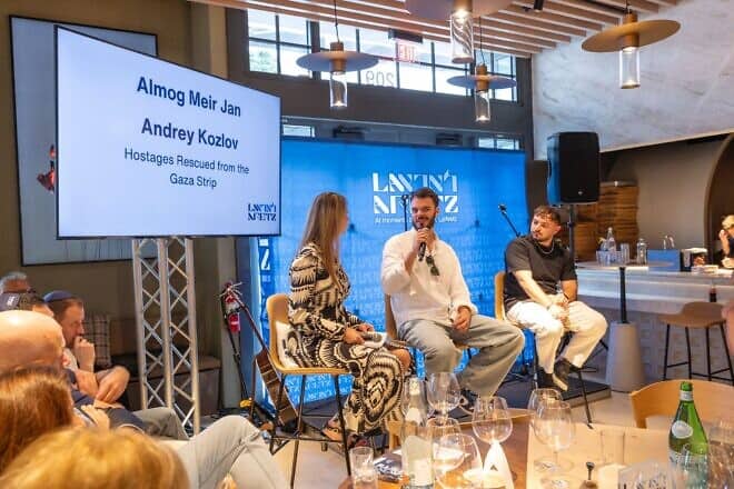 Andrey Kozlov (center) speaks about the rescue operation that saved his life with Almog Meir Jan (right) in a discussion with Maya Vander during La'Aretz Foundation's fundraiser at Malka West Palm Beach, Fla., on Dec, 15, 2024. Photo by Shay Cohen.