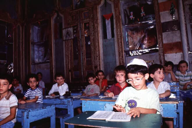 Pupils at the Maimonides school in Damascus, shortly before the exodus of Syria's remaining Jews, Feb. 9, 1991. Credit: Courtesy of Diaspora Museum Visual Documentation Archive, Tel Aviv, via Wikimedia Commons.