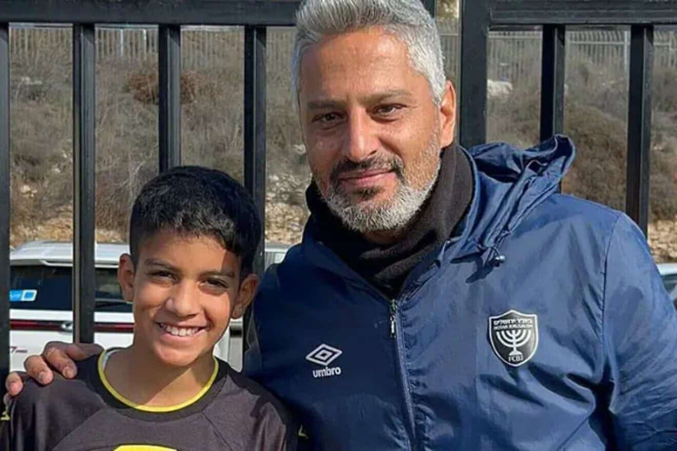 Oct. 7 survivor Yoav Roditi, 11, and Beitar Jerusalem FC coach Barak Itzchaki. Photo courtesy of Beitar Illit spokesperson.
