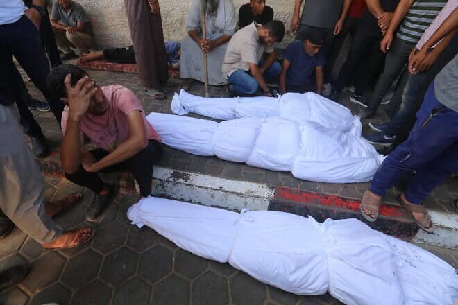 Bodies lie at the entrance to Al-Aqsa Martyrs Hospital in Deir al-Balah, in the central Gaza Strip, on Sept. 7, 2024. Photo by Ali Hassan/Flash90