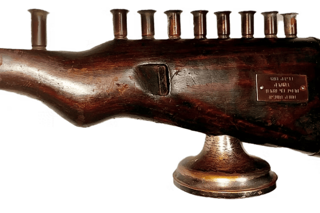 A Chanukah menorah from an Israel Defense Forces Soldier built from a World War II German Mauser rifle is one of the items up for auction to benefit Beit Udi. Credit: Courtesy.