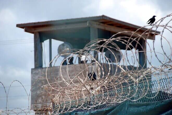 A guard tower over the detention facility at Guantanamo Bay, on Sept. 12, 2007. Credit: Army Sgt. Joseph Scozzari via Wikimedia Commons.