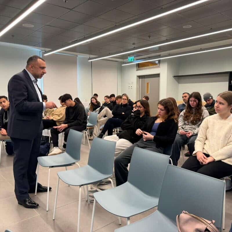 Majed el-Shafie, president and founder of the Toronto-based One Free World International organization, speaks with Israeli pupils at the Begin High School in Ramat Gan, on Jan. 15, 2025. Credit: Courtesy.