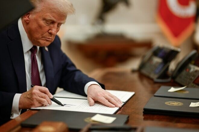 U.S. President Donald Trump signs executive orders on the first day of his second term, Jan. 20, 2025. Credit: White House.