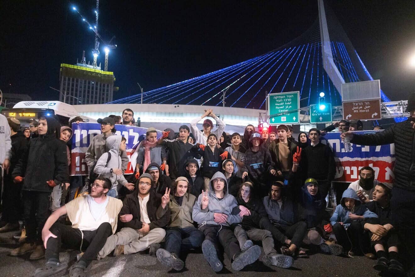 Israelis protest against the hostages-for-terrorists deal with Hamas, at the main entrance to Jerusalem, on Jan. 16, 2025. Photo by Chaim Goldberg/Flash90.