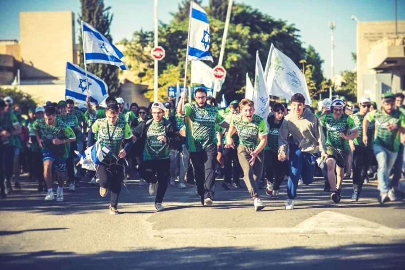 More than 400 North American gap-year and college students pound the pavement at ADI Negev-Nahalat Eran to raise disability awareness and secure PTSD treatments for Israel’s most vulnerable citizens during ADI’s third “Race for Inclusion” on Dec. 24, 2024. Credit: ADI.