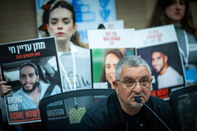 Danny Elgarat, whose brother, Itzik Elgarat, held been held hostage by Hamas in the Gaza Strip since the terrorist attacks in southern Israel on Oct. 7, 2023, attends a Defense and Foreign Affairs Committee meeting at the Knesset in Jerusalem on Jan. 7, 2025. Photo by Yonatan Sindel/Flash90.