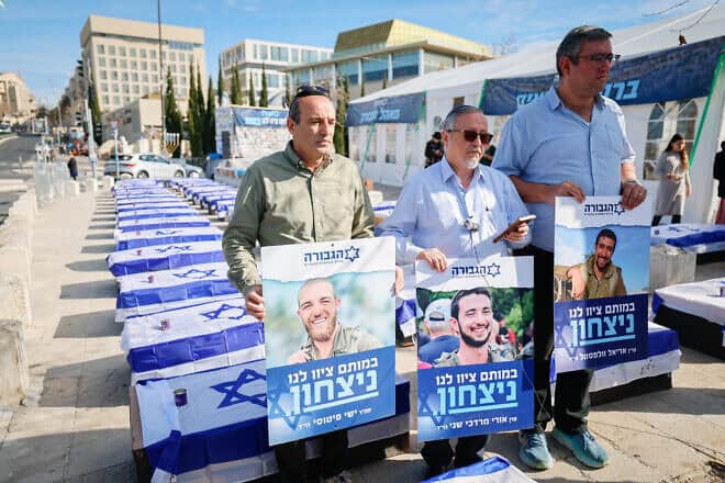 Empty coffins are seen outside Israeli Prime Minister Benjamin Netanyahu's office in Jerusalem, as part of a protest against the ceasefire deal between Israel and Hamas, on Jan. 16, 2025. Photo by Yonatan Sindel/Flash90.