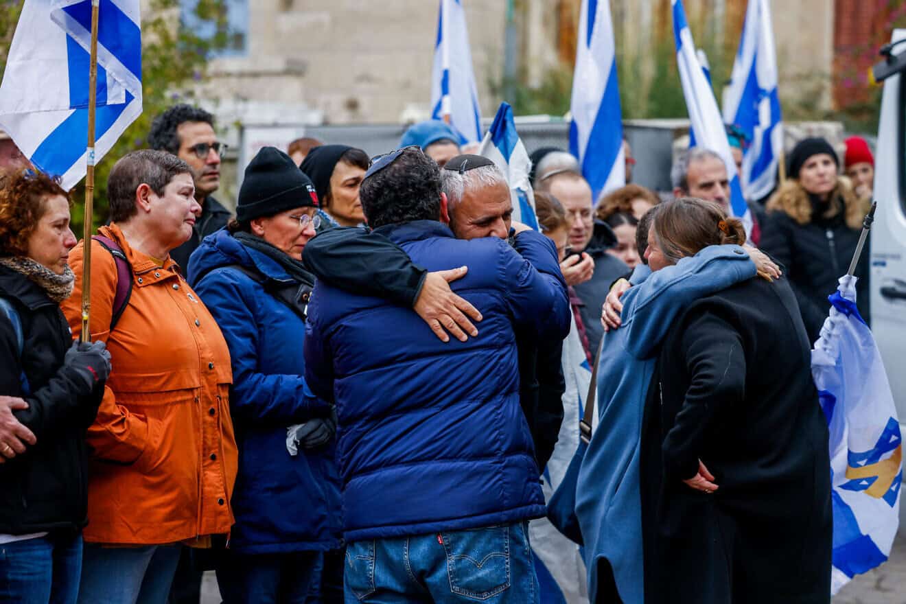 Family members of 1st. Sgt. Yuval Shoham, who was killed in battle in the Gaza Strip, leaving their home to his funeral in Jerusalem on Dec. 30, 2024. Photo by Chaim Goldberg/Flash90.