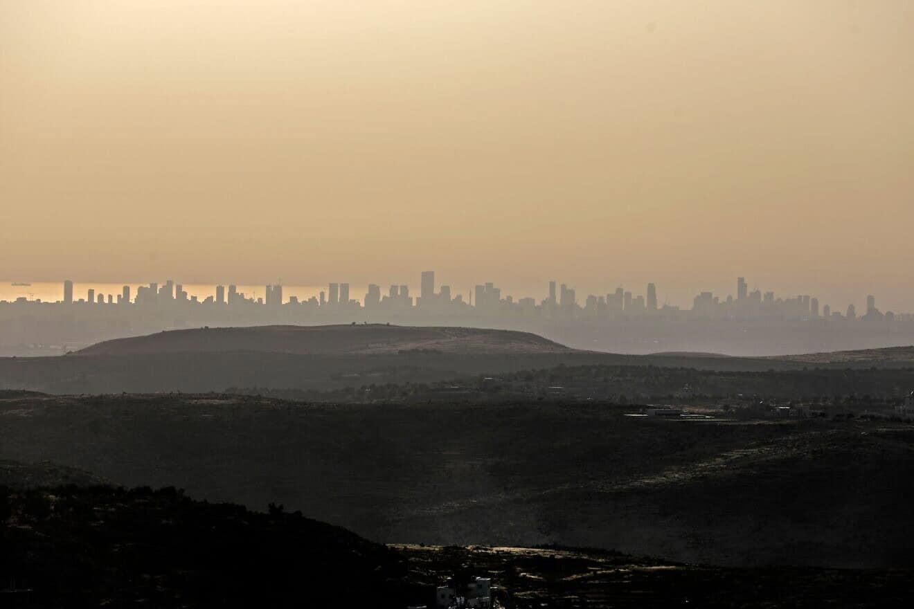 The Tel Aviv skyline as seen from western Samaria, June 17, 2020. Photo by Menahem Kahana/AFP via Getty Images.