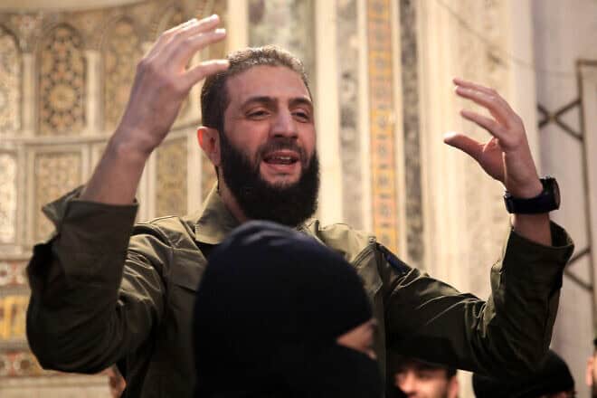 Ahmed al-Sharaa, aka Abu Mohammed al-Jolani, the leader of Hayat Tahrir al-Sham, addresses a crowd at the Umayyad Mosque in Damascus, Syria, on Dec. 8, 2024. Photo by Aref Tammawi/AFP via Getty Images.