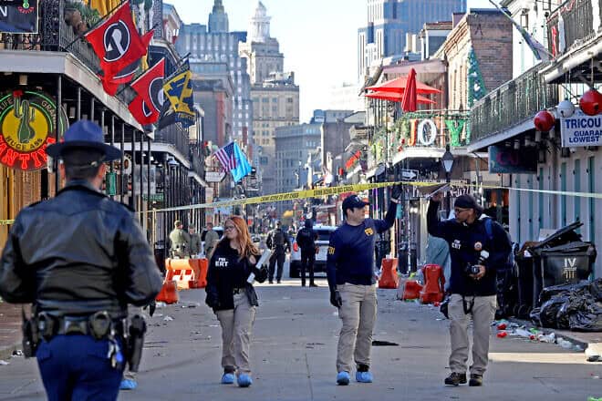 Law enforcement officers from multiple agencies work the scene on Bourbon Street after at least 15 people were killed when a person allegedly drove into a New Year's Day crowd in New Orleans, La., on Jan. 1, 2025. Photo by Michael DeMocker/Getty Images.