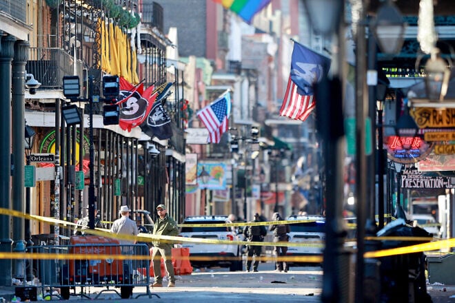 Law-enforcement officers work the scene on Bourbon Street in New Orleans after 15 people were killed when a man drove into the crowd early on New Year's Day, Jan. 1, 2025. Photo by Michael DeMocker/Getty Images.