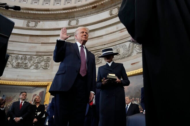 U.S/ President-elect Donald Trump takes the oath of office as Melania Trump looks on during inauguration ceremonies in the Rotunda of the U.S. Capitol, Jan. 20, 2025 in Washington, D.C. Credit: Morry Gash/Pool/AFP.