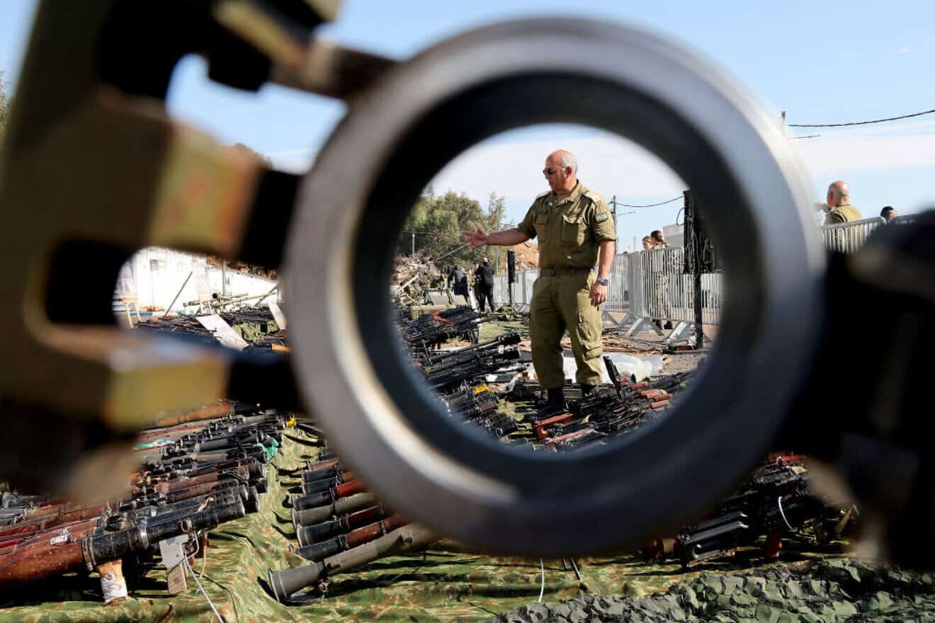 Hezbollah weapons and other equipment that the IDF seized during its ground operation in Southern Lebanon are displayed for the media at an army base in the Galilee on Dec. 23, 2024. Photo by Jack Guez/AFP via Getty Images.