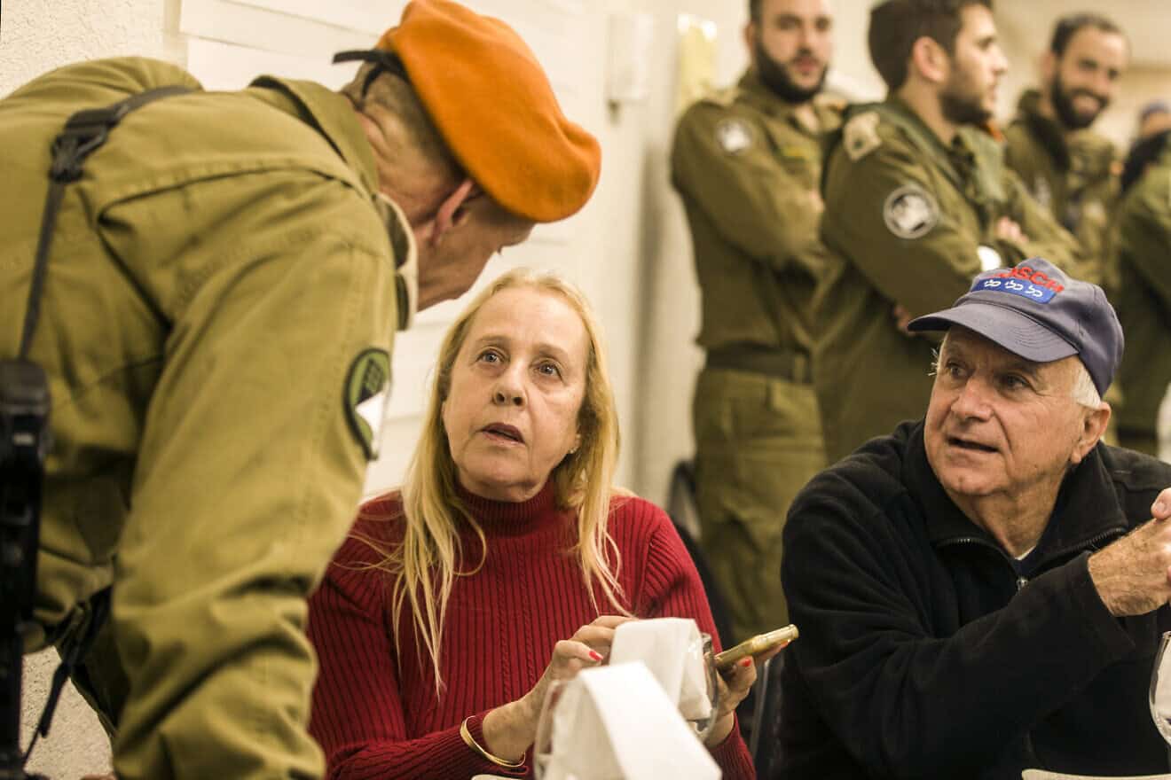 OC Home Front Command Maj. Gen. Rafi Milo speaks with bereaved family members at the IDF's Urim Base near Gaza on Jan. 1, 2025. Photo by Rina Castelnuovo.
