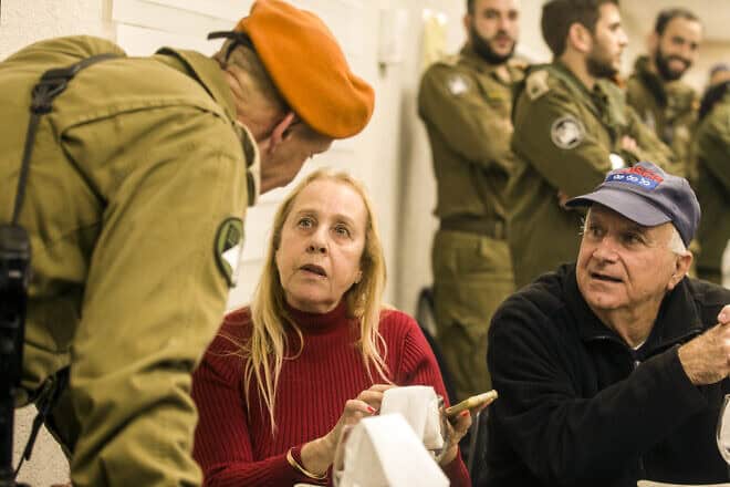 OC Home Front Command Maj. Gen. Rafi Milo speaks with bereaved family members at the IDF's Urim Base near Gaza on Jan. 1, 2025. Photo by Rina Castelnuovo.